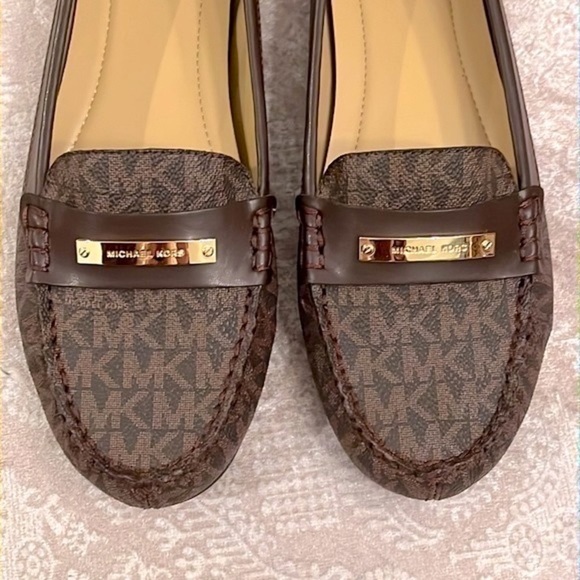 Brand New Michael Kors Brown Loafers Slip On Flats w/ Gold Tone Metal Logo Bar - Picture 3 of 16